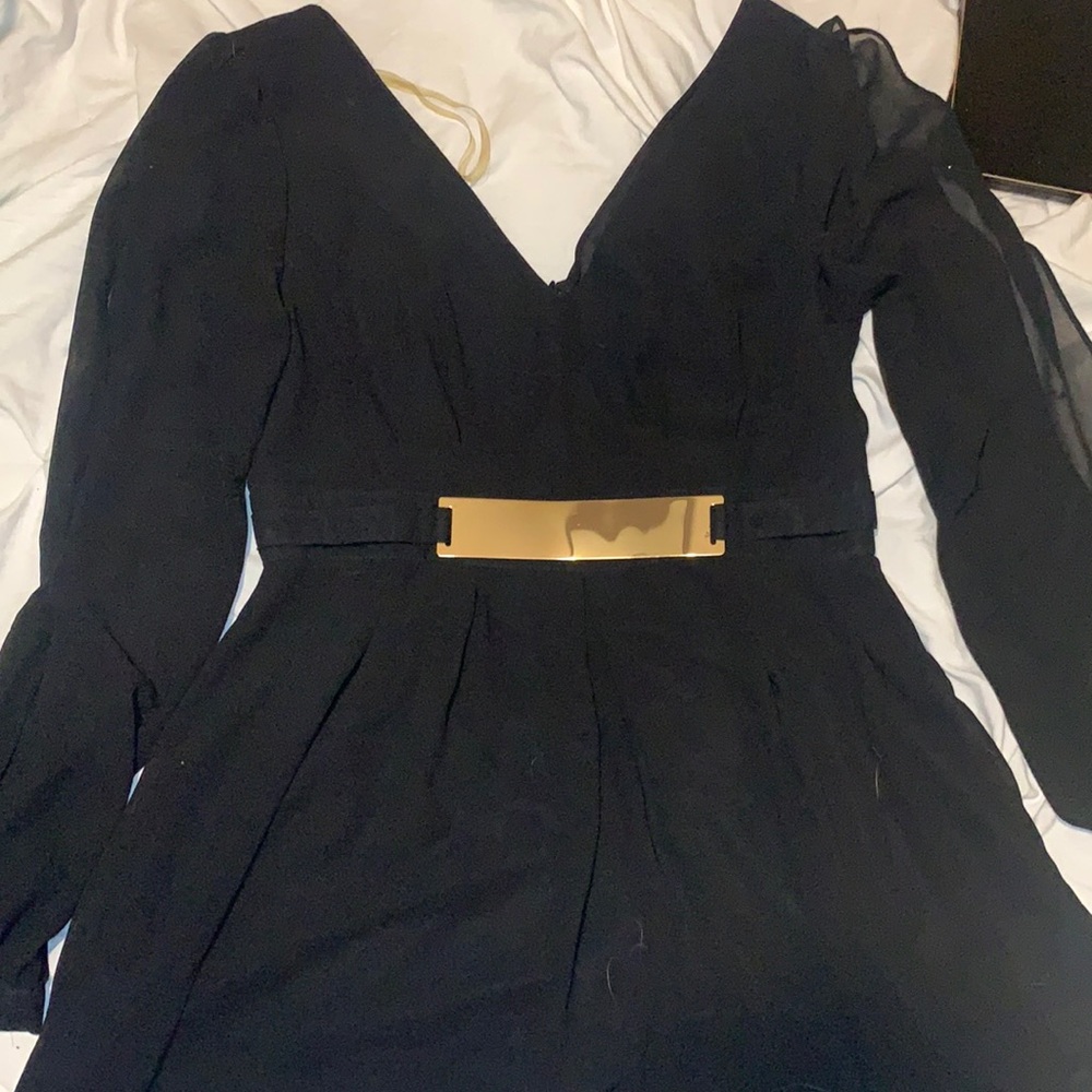 Black romper with gold detail